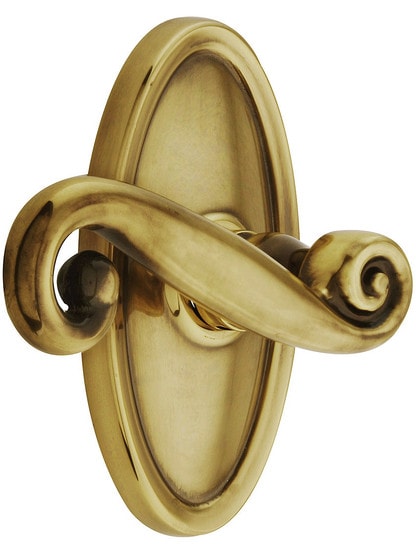 Oval Rosette Set With Scroll Design Levers in Antique Brass with .